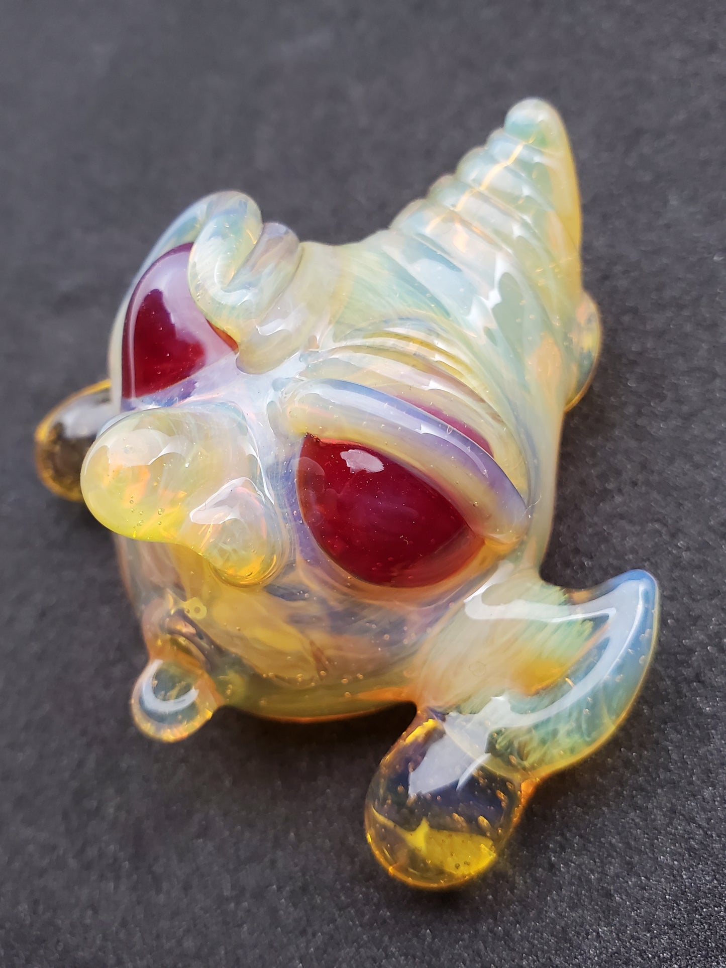 yellow goblin pendant