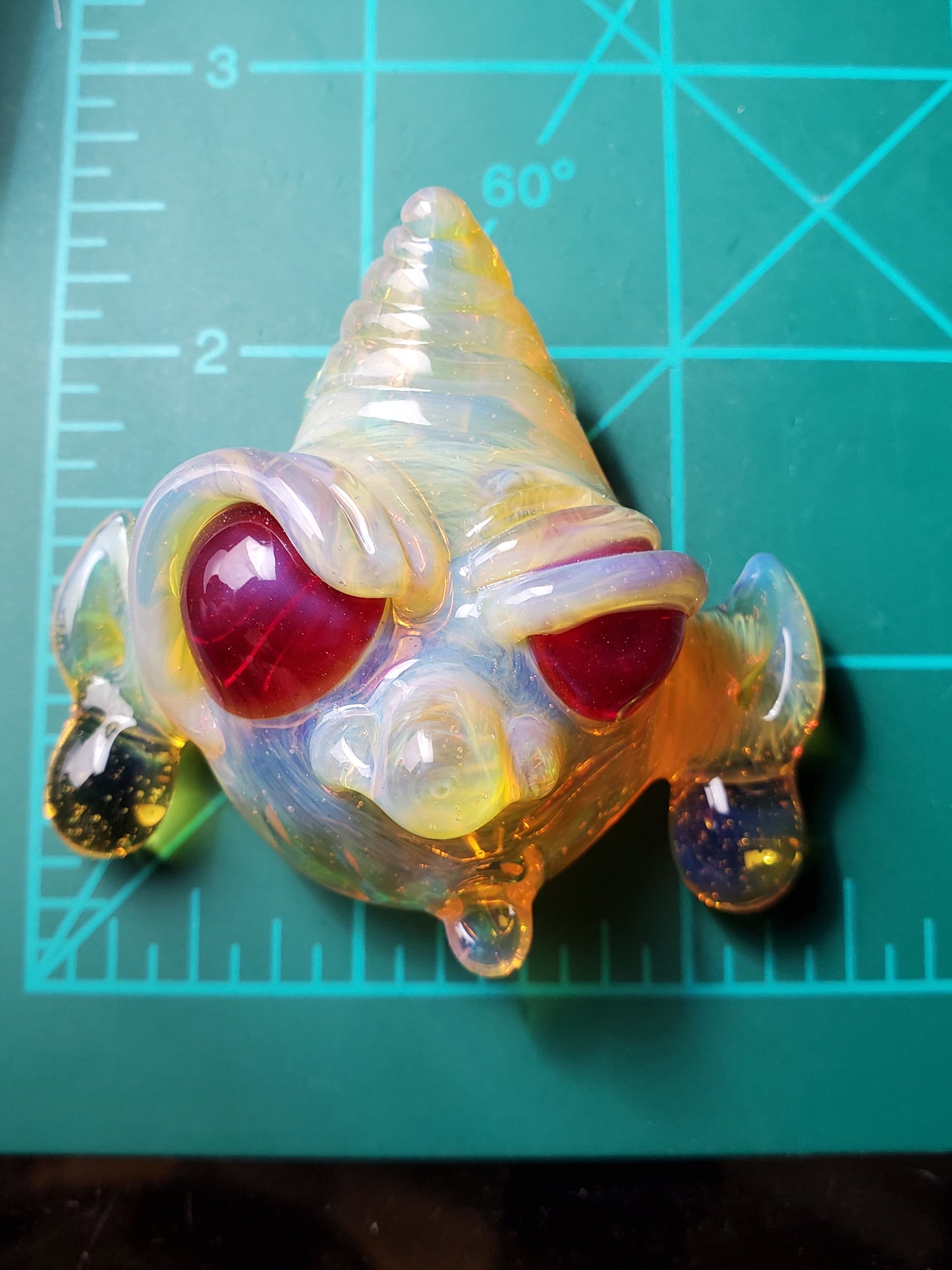 yellow goblin pendant