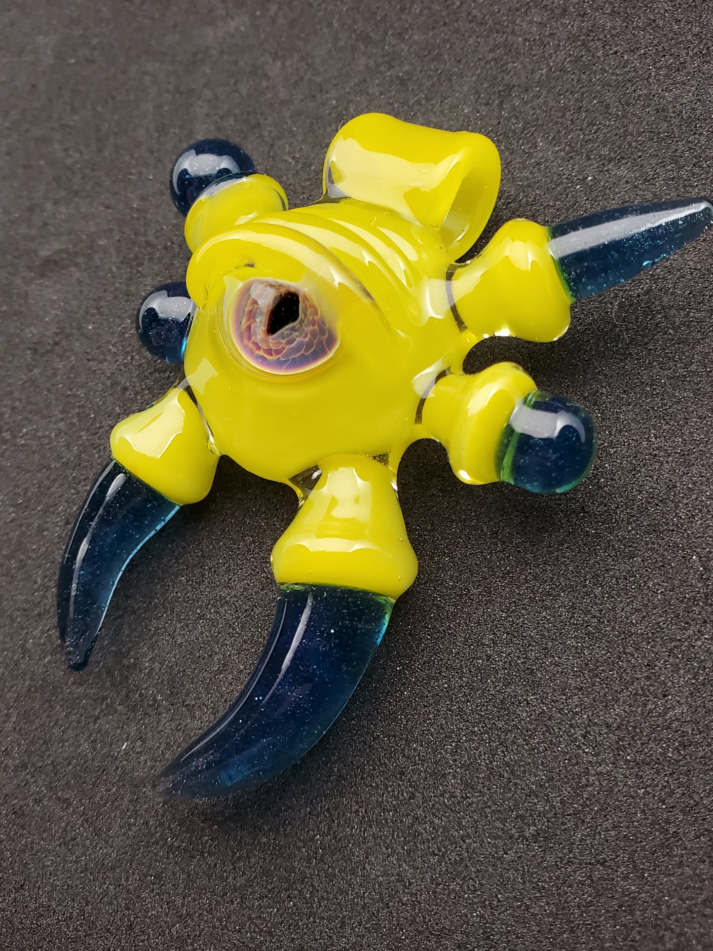 yellow/blue alien key pendant