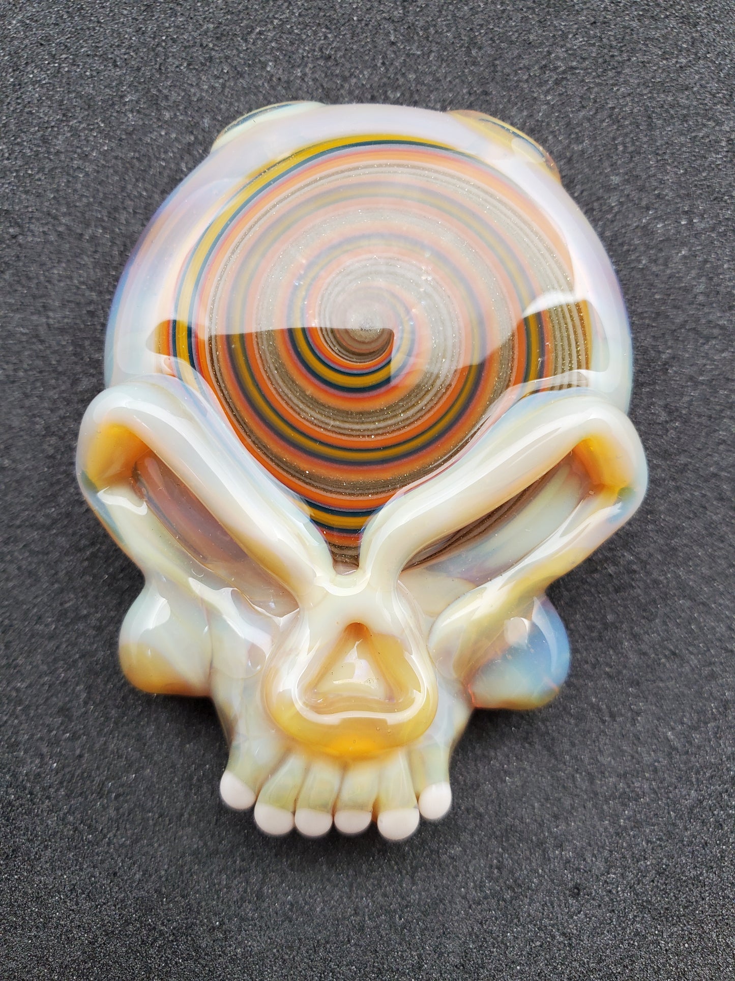 spiral skull pendant